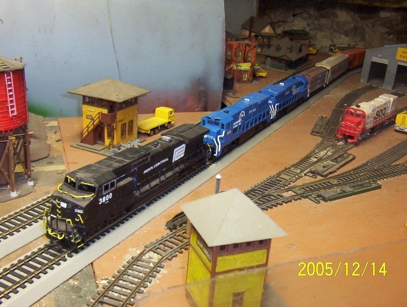 Photo of penncentral 8-40cw#3800 and two conrail b23-7's