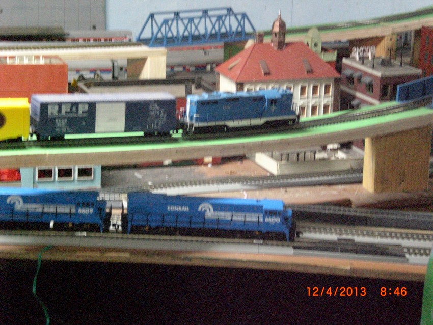 Photo of b&m loco working the branch passing over a conrail freight