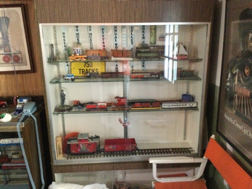 Photo of Trains in bookcase
